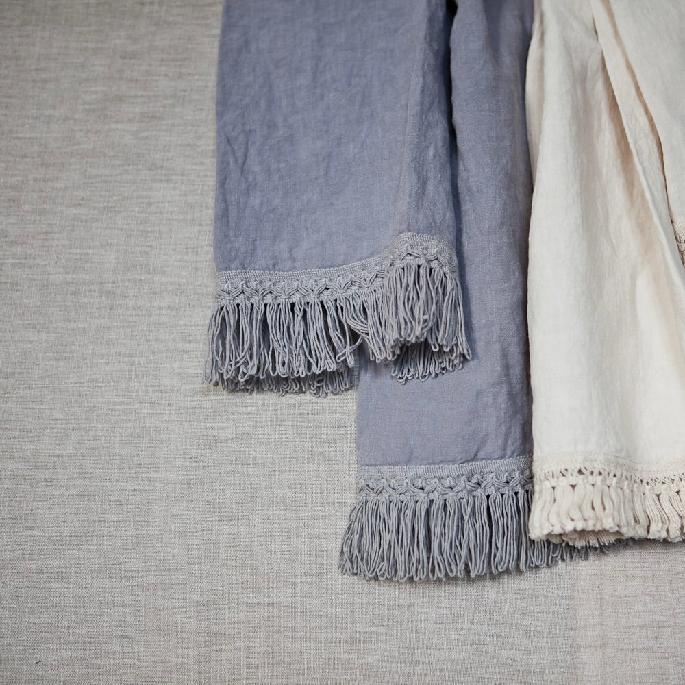towels with long fringe on both ends, sample item