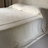bed cover with contrasting piping in fine upholstery linen, archive sale